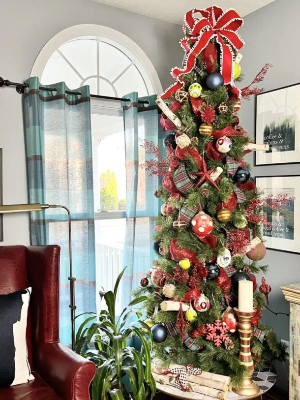 tall thin Christmas tree in a diningroom